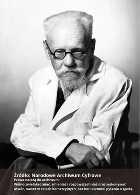 Fotografia czarno-biała przedstawiająca portret mężczyzny z wąsami, brodą i okularami, ubranego w biały fartuch. Na dole zdjęcia napis "Źródło: Narodowe Archiwum Cyfrowe oraz Prawa należą do archiwum...