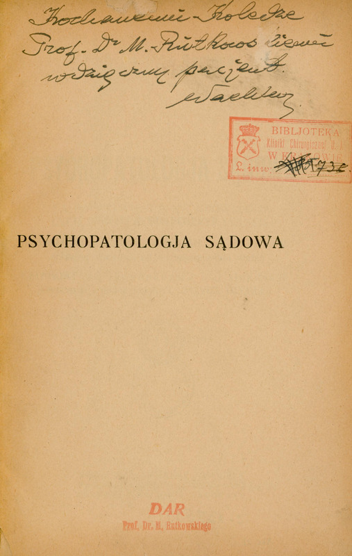 Ilustracja czarno-biała przedstawia stronę tytułową dzieła prof. Wachholza pod tytułem Psychopatologia sądowa. Tytuł drukowanymi literami. U góry odręczna dedykacja „Kochanemu koledze prof. Dr M. Rutkowskiemu wdzięczny pacjent Wachholz” Na dole strony pieczątka „Dar prof. Rutkowskiego”.